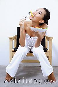 Asia Images Group - Woman eating salad