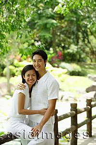 Asia Images Group - Couple embracing, looking at camera, portrait