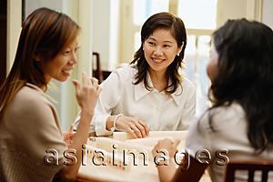 Asia Images Group - Women sitting around mahjong table
