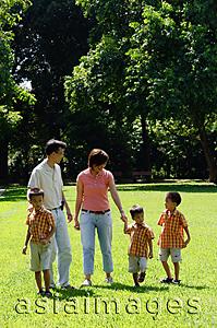 Asia Images Group - Family with three boys walking in park