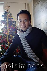 Asia Images Group - Man in sweater and scarf