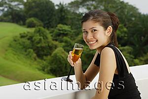 Asia Images Group - Young woman with champagne glass