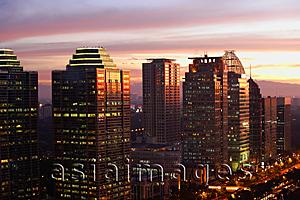 Asia Images Group - Sunset view of office buildings and skyscrapers along Jalan Jend Sudirman, Senayan, Jakarta