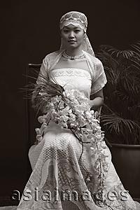 Asia Images Group - Woman in wedding gown, portrait