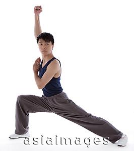 Asia Images Group - Young man practicing Kong fu