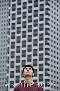 Asia Images Group - Man looking up, eyes closed