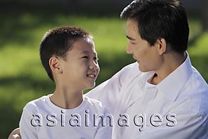 Asia Images Group - Father and son looking at eachother