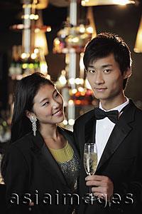 Asia Images Group - Young couple dressed up in a club at night