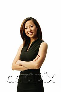 AsiaPix - Woman smiling at camera, arms crossed, portrait