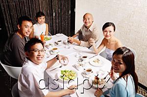 AsiaPix - Couples at dining table, looking at camera