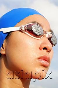 AsiaPix - Woman wearing swimming goggles, head shot