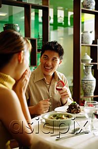 AsiaPix - Couple in restaurant, man proposing with ring