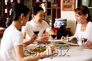 AsiaPix - Women in restaurant, sitting at table, talking