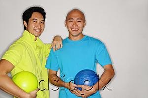 AsiaPix - Two men holding bowling balls, smiling at camera
