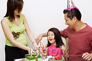 AsiaPix - Family with one child celebrating a birthday