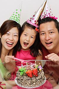 AsiaPix - Family with one daughter celebrating a birthday