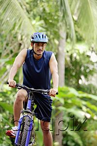 AsiaPix - Man riding bicycle
