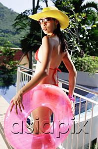 AsiaPix - Woman in red bikini and hat, holding inflatable ring
