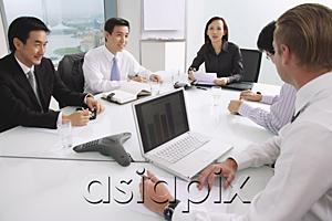 AsiaPix - Executives sitting around conference table, having a meeting