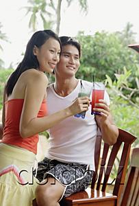 AsiaPix - Couple with drinks, looking away