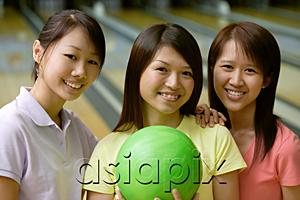 AsiaPix - Women at bowling alley, smiling at camera