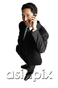 AsiaPix - Businessman using mobile phone