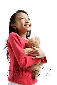 AsiaPix - Girl hugging teddy bear