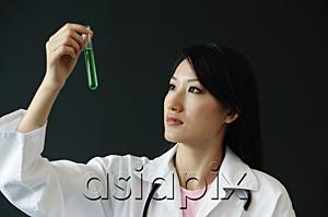 AsiaPix - Doctor looking at test tube