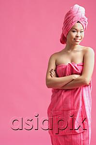 AsiaPix - Woman wrapped in a pink towel, wearing pink turban, arms crossed