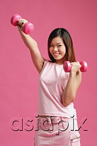 AsiaPix - Woman dressed in pink, using dumbbells