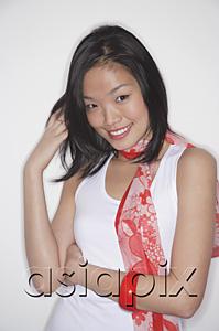 AsiaPix - Woman in white top and scarf against white background