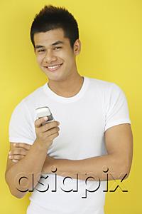 AsiaPix - Man holding mobile phone