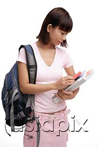 AsiaPix - Young woman with backpack and books