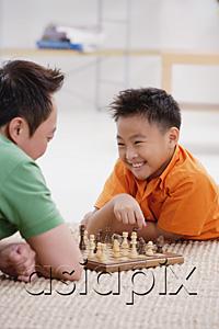 AsiaPix - Father and son playing chess