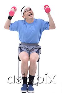 AsiaPix - Man sitting on stool, lifting dumbbells