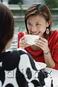 AsiaPix - Two women having coffee