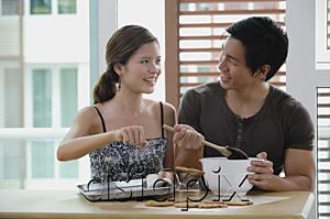 AsiaPix - Couple in kitchen, making cookies