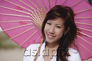AsiaPix - Young woman with pink umbrella