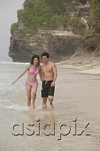 AsiaPix - Couple walking on beach