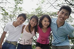AsiaPix - Young adults in park, smiling at camera