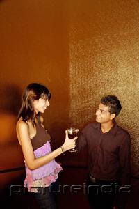 PictureIndia - Couple toasting with drinks