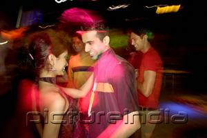 PictureIndia - Young people dancing in night club