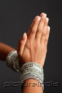 PictureIndia - Close-up of woman's hands together in prayer position