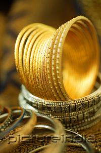 PictureIndia - Still life with gold Indian bangles